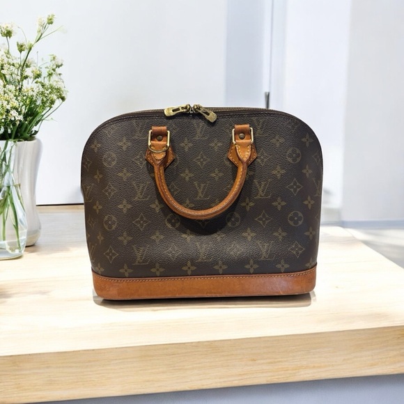 Louis Vuitton Handbags - Louis Vuitton Alma Monogram Coated Canvas Handbag